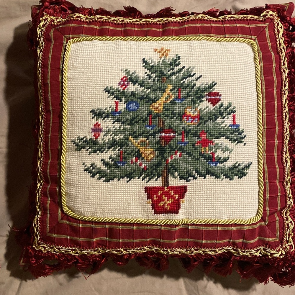 Decorative embellished embroidered Christmas pillows.